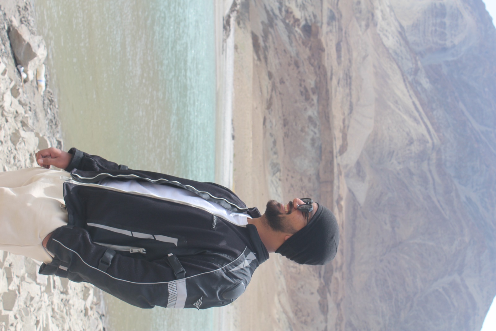 Sharath in a bike riding jacket at Sangam viewpoint, Leh